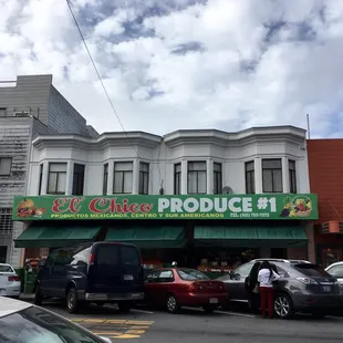 cars parked in front of a store