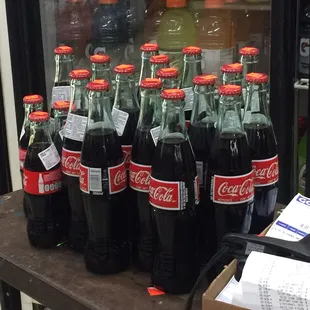 a display of coca cola bottles