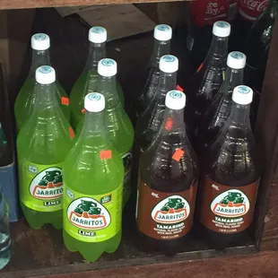 a variety of bottles of soda