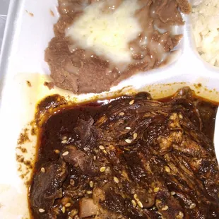 Mole Poblano lunch special. Sm. portions compared to eating it there. Plus no salad garnishes!