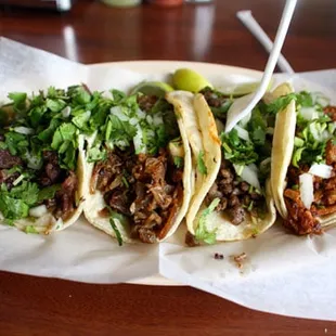 three tacos on a plate