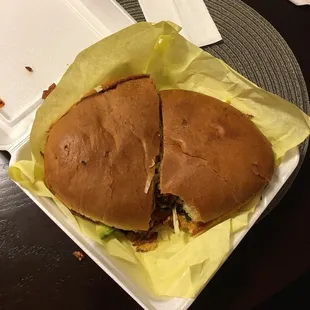 Huge!!!! Torta, this one is Al Pastor with a man size bite,  for scale purposes!