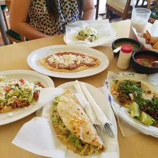 Omg. Squash tortilla quesadilla filled eith veggies and pastor, two huaraches, two tacos, very flavorful horchata, sope with fresh masa.