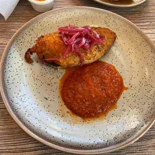Crispy Barbacoa Relleno sauce in the side