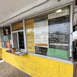 menus on the window of a restaurant