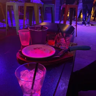 a plate of food and a drink on a table