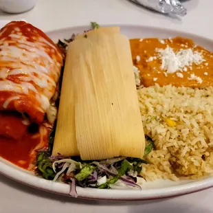 Combination plate with mini chimi, corn tamale, rice, and beans.  Just under $20.