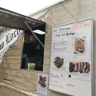 a food truck with menus