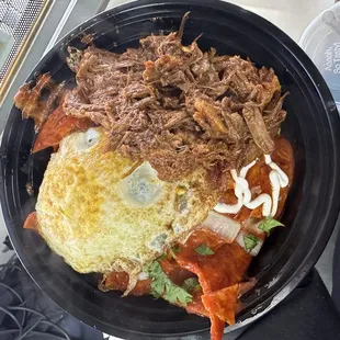 Red chilaquiles with Birria