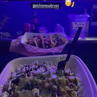 Asada fries, tacos of asada, carnitas, chorizo and pastor.