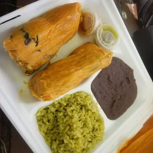 2 Tamale plate with black means and cilantro rice