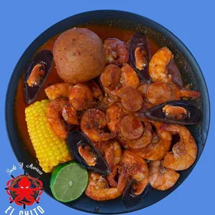 a plate of seafood and corn