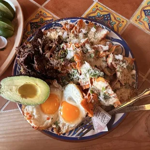 Chilaquiles Plate with Birria + avocado $1.50