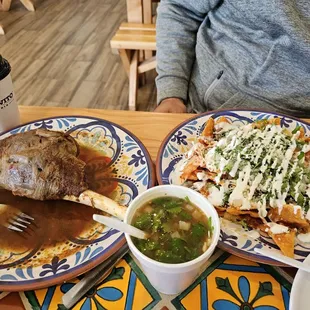 Pistolita consome and chilaquiles de birria.