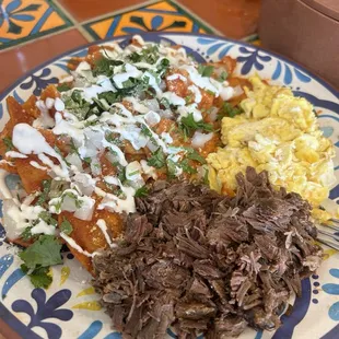 Chilaquiles Plate with Birria and 2 Eggs