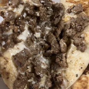 a close up of a pita sandwich