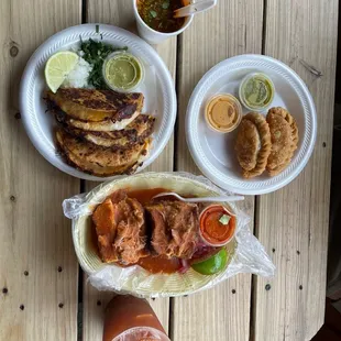 Empanadas, birria tacos, and Carnitas Torta Ahogada