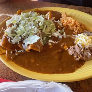 Dry rice and beans, half ass enchiladas, nasty nachos, cheese from a can at best.