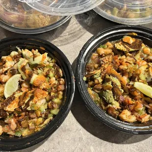 two bowls of food on a table