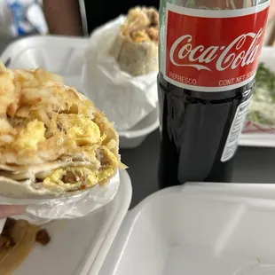 Sausage breakfast burrito  Burrito de asada  Coca de botella