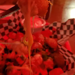 Close up of Tachos appetizer (under red light)