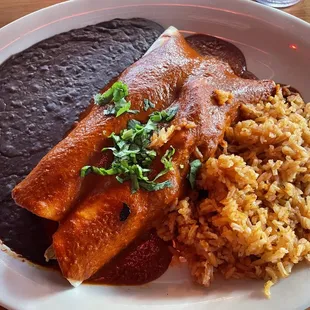 Vegan enchiladas with choice of vegan meats inside