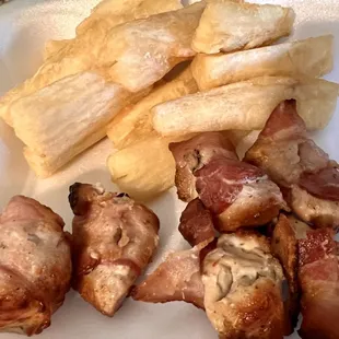 Chicken wrapped bacon with yuca fries.