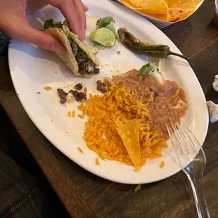 steak tacos, beans, rice