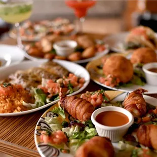 Our appetizers include stuffed shrimp, empanadas, papa rellena, nachos, queso fundido and so much more!