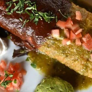 Our popular burritos can be dressed to your liking, Chimichanga style or dipped in your choice of salsa. Mole / Salsa Verde seen here