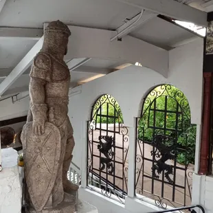 Stairs leading down to patio and dining room