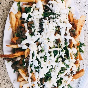 Carne asada fries                                       Carne asada, homemade fries, cilantro, onion, and sour cream