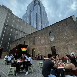 a group of people eating outside