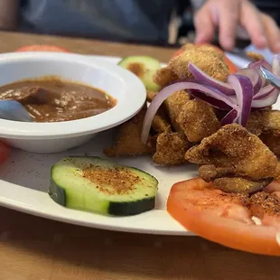 chicharrón, de botana. Spicy/ smokey salsa...rico!