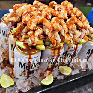 Charola Pirata 12- (Beers Topped with Seafood Mix)