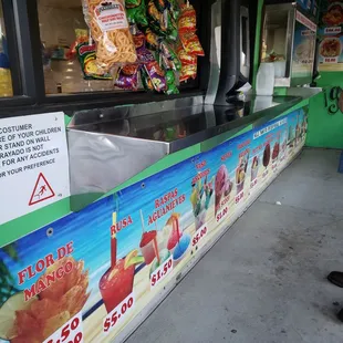 a sign for a food stand
