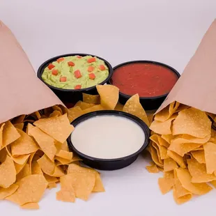 Family Pack Appetizer! Large cheese dip, guac and salsa and 2 large bags of tortilla chips to go!!