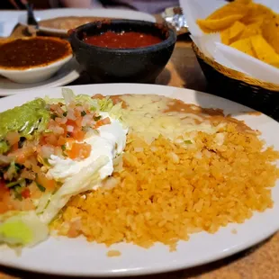 a plate of mexican food on a table