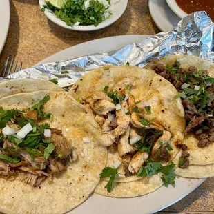Carnitas, chicken. Steak tacos All were very good!