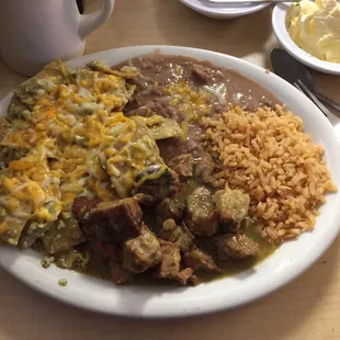 Chilaquiles verdes with chile verde meat.