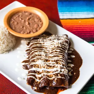 Enmoladas (red mole enchiladas)