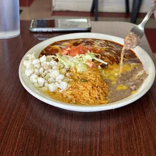 a plate of mexican food on a table