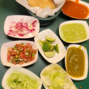 Offerings from the salsa bar (minus the grilled onions and jalepenos that weren't available when I took this picture). All delicious!!
