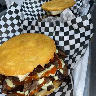 Arepa The Coplera. Pork, picanha,  sausage,  ketchup, green sause and cheese.