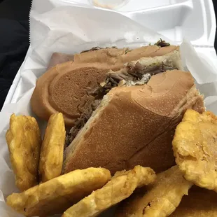 This is amazing Cuban sandwich! So good tostones!!! Sure need the Malta India!