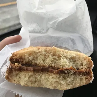 Cross section of my favorite cookie, alfajores. That is dulce de leche in the middle.