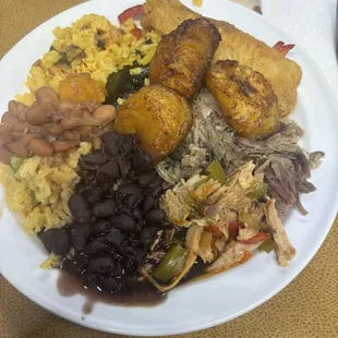 A little bit of everything at the buffet. It was all good, but the seafood rice and the chicken were the all stars of the plate.