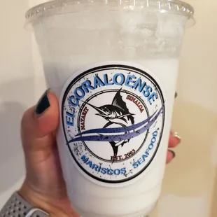 horchata with coconut milk! no regular milk i think! not bad! reminds me of coconut rice desserts.