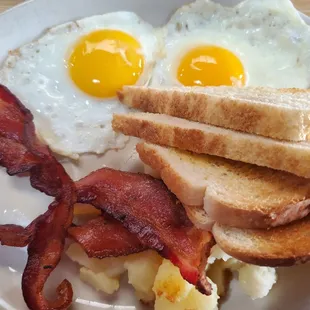 bacon, eggs, and toast on a plate
