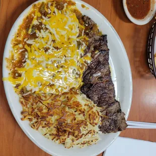 Carne asada,  OE eggs, hash for beans and rice.  The best anywhere!
